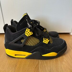 Nike Air Jordan 4 Retro Thunder (2023) Black and Yellow Sneakers
